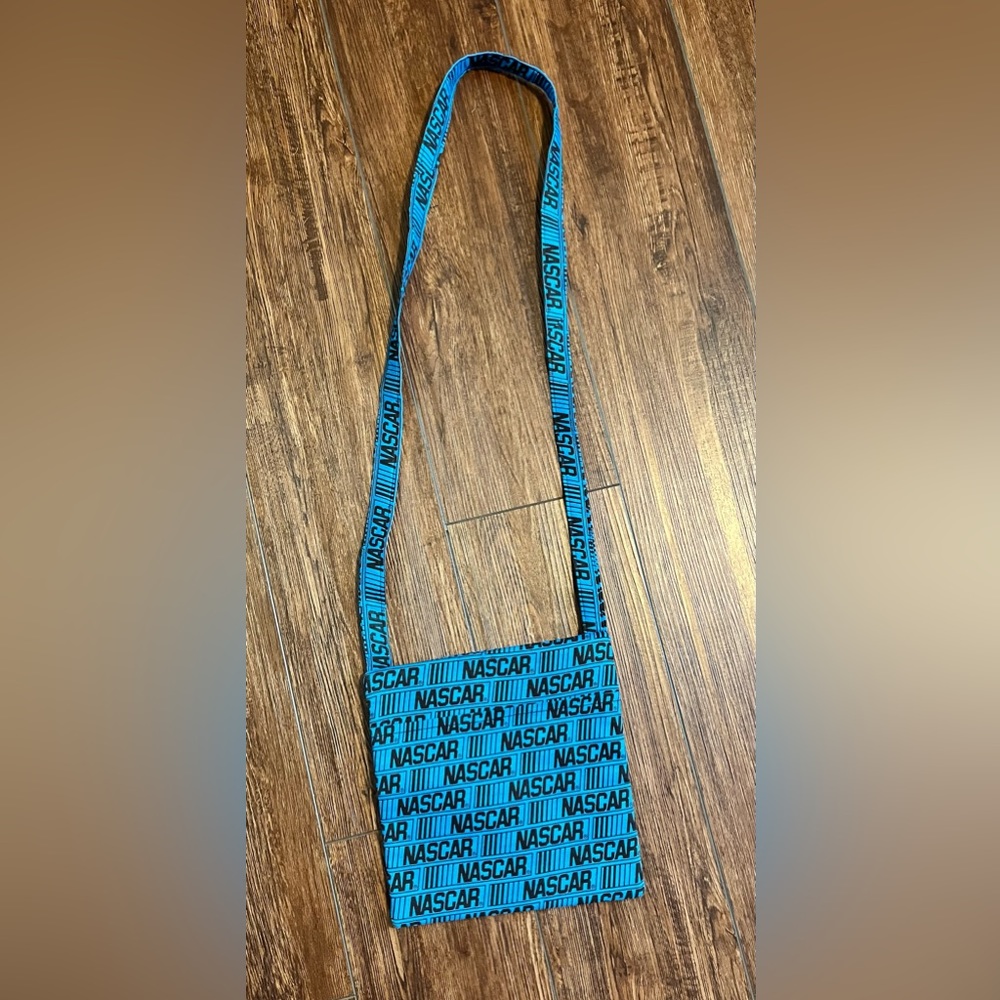EUC NASCAR Crossbody bag. Two pockets. Strap is NOT adjustable. Blue & black.